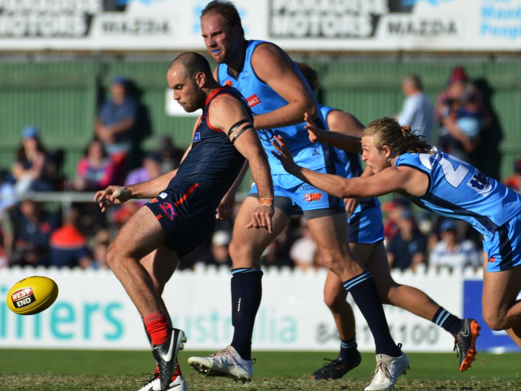 SANFL: Norwood v Sturt at Norwood Oval, Monday, April 2, 2018. Norwood captain Jace Bode kicks away. (AAP Image/ Brenton Edwards)