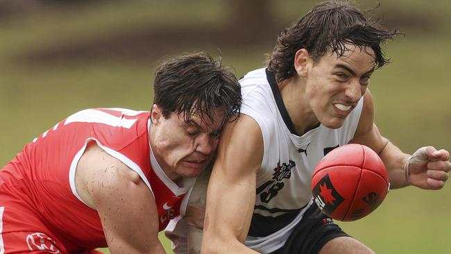 The Knights’ Samuel Grant leaves his mark on Liam Puncher.