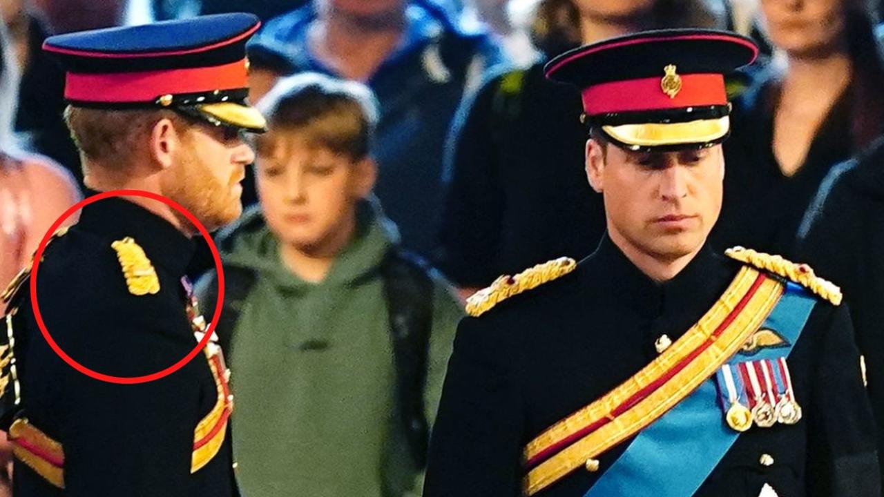 Prince Harry was not wearing the Queen’s ER initials on his shoulder. (Photo by Aaron Chown-WPA Pool/Getty Images)