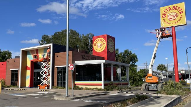 Signwriters were spotted updating the signage and exterior of the former Taco Bell restaurant and drive through to Getta Betta. Picture: Leighton Smith.