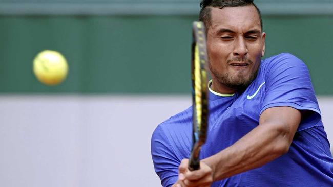 TITLE POTENTIAL: John McEnroe does not see Nick Kyrgios winning Wimbledon this year but he does believe the Aussie has the skills to win multiple grand slam titles. Picture: YOAN VALAT