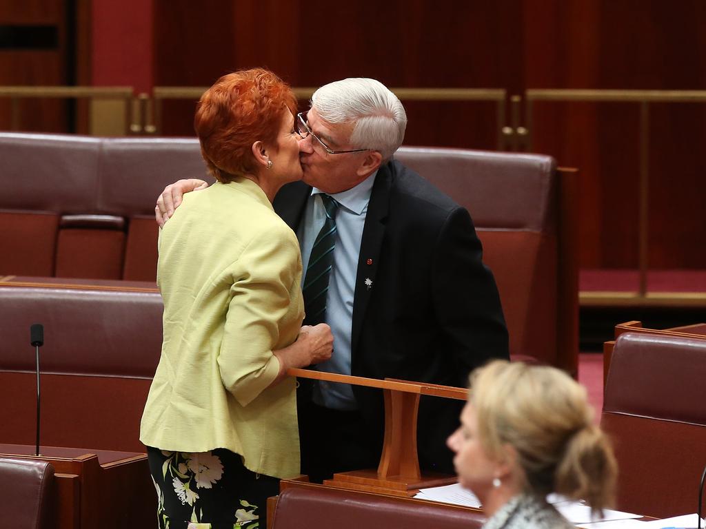 Pauline Hanson congratulating her former One Nation senator Brian Burston after delivering his first speech in 2016. Picture Kym Smith