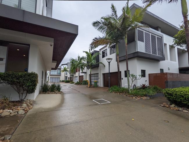 Garages to the rear of townhouses at the Salacia Waters development in Paradise Point. Picture: Keith Woods.