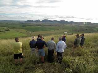 JUST ADD WATER: Coalstoun Lakes farmers with Member for Flynn Ken O'Dowd look down on the valley that would benefit from a regular supply of water. Picture: Erica Murree