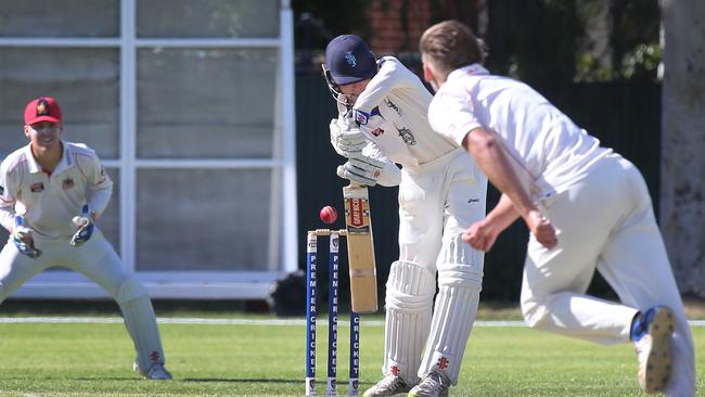 Adelaide's Josh Pengelly gets one past the edge of Sturt’s Tom Kelly at Glandore Oval on Saturday. Picture: AAP/Dean Martin