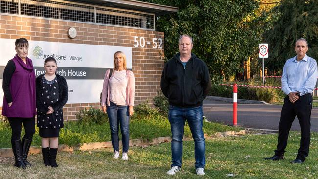 Family members of Newmarch House residents Liz and Samantha Lane, Simone Breia, Anthony Bowe and Charlie Breia outside the nursing home on Tuesday, May 5. Nearly 20 people died as a result of the outbreak at the nursing home. Picture: Monique Harmer