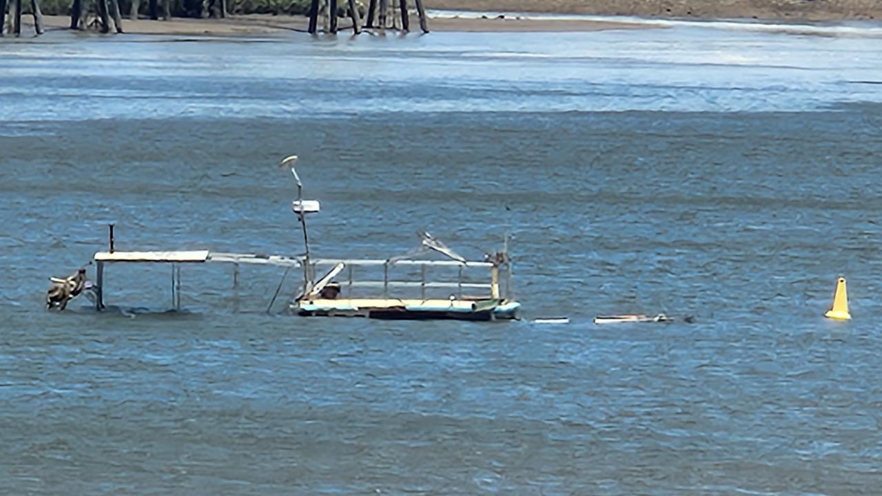 A sunken vessel in the Calliope River at Gladstone on January 23. Photo Darryn Nufer.