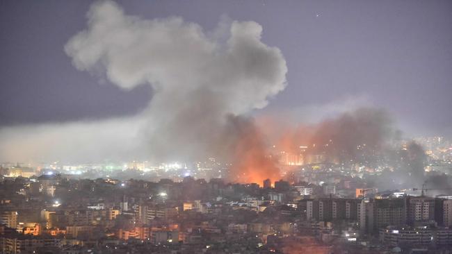 Smoke rises from an Israeli airstrike on Beirut’s southern suburbs on Thursday night. Picture: AFP