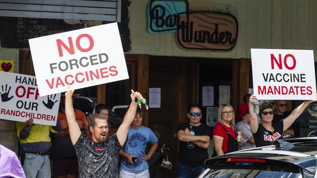 People protest outside Bar Wunder after the bar was shut down over failing to comply with the public health direction. Picture: Kevin Farmer