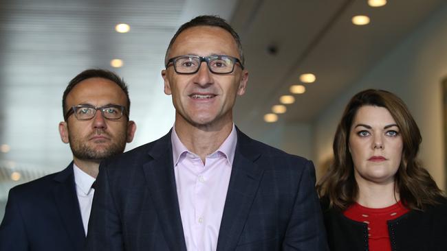 Greens Energy &amp; Climate Change spokesman Adam Bandt MP, Greens Leader Dr Richard Di Natale, and Greens Education spokesman Senator Sarah Hanson-Young at Parliament House in Canberra.