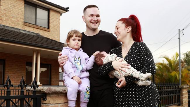 Eddie Dilleen, with wife Francesca and kids Aurora and Forrest, bought for properties in “undervalued” Greenacre. Picture: Tim Hunter