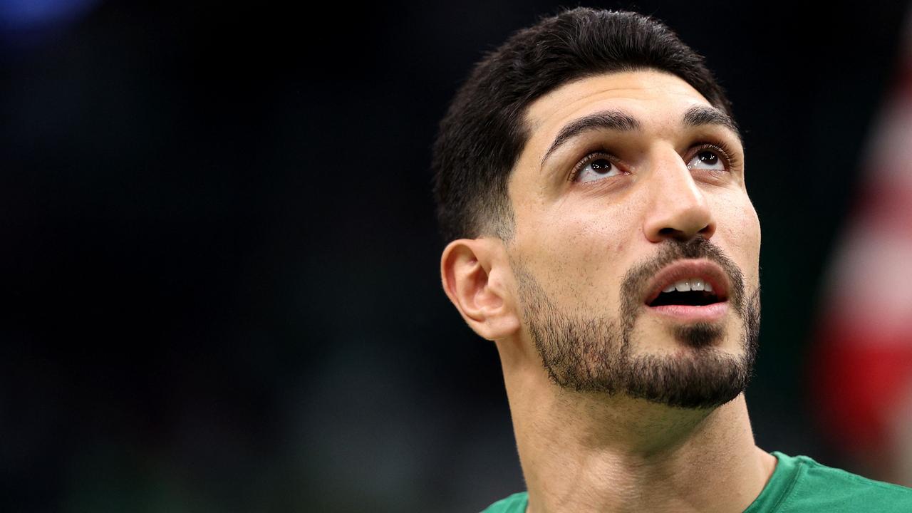 (FILES) In this file photo taken on October 21, 2021, Enes Kanter of the Boston Celtics looks on before during the Celtics home opener against the Toronto Raptors at TD Garden on October 22, 2021 in Boston, Massachusetts. - Enes Kanter, the Boston Celtics center from Turkey, will change his name to Enes Kanter Freedom when he takes US citizenship on November 28, 2021, The Athletic sports website reported (Photo by Maddie Meyer / GETTY IMAGES NORTH AMERICA / AFP)
