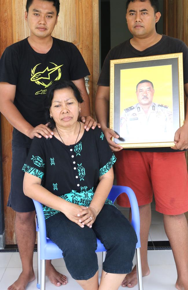 Wayan Sudarsa's wife Ketut Arsini and her two sons Putu Yudi (R), and Kadek Toni (L) in their home in Jimbaran, Bali. Picture: Lukman S. Bintoro