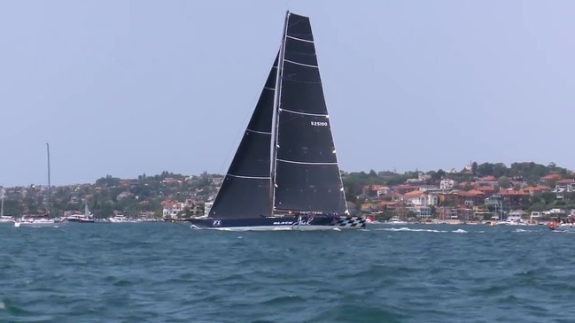 Yachts race out of the heads in the Sydney to Hobart