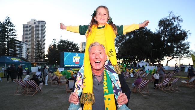 Ian Hanson and grandaughter Matilda Clarke, 5, at the Gold Coast Olympics party. Picture: Glenn Hampson.