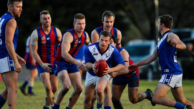 Kenilworth’s Nicholas Chesser in a match against Hope Valley last season. The Kookaburras and Demons will clash in the second semi-final this Saturday. Picture: AAP/Morgan Sette