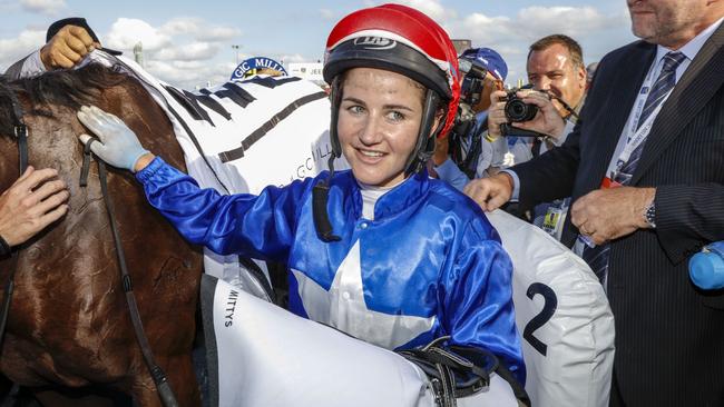 Jockey Michelle Payne wins the Myer Magic Millions Sprint on Husson Eagle at the Magic Millions racing carnival at the Gold Coast Turf Club on the Gold Coast, Saturday, Jan. 9, 2016. (AAP Image/Glenn Hunt) NO ARCHIVING, EDITORIAL USE ONLY