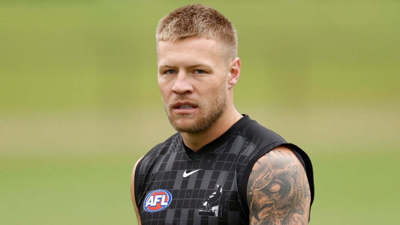 MELBOURNE, AUSTRALIA - MARCH 16: Jordan De Goey of the Magpies looks on during a Collingwood Magpies AFL training session at Olympic Park Oval on March 16, 2022 in Melbourne, Australia. (Photo by Darrian Traynor/Getty Images)