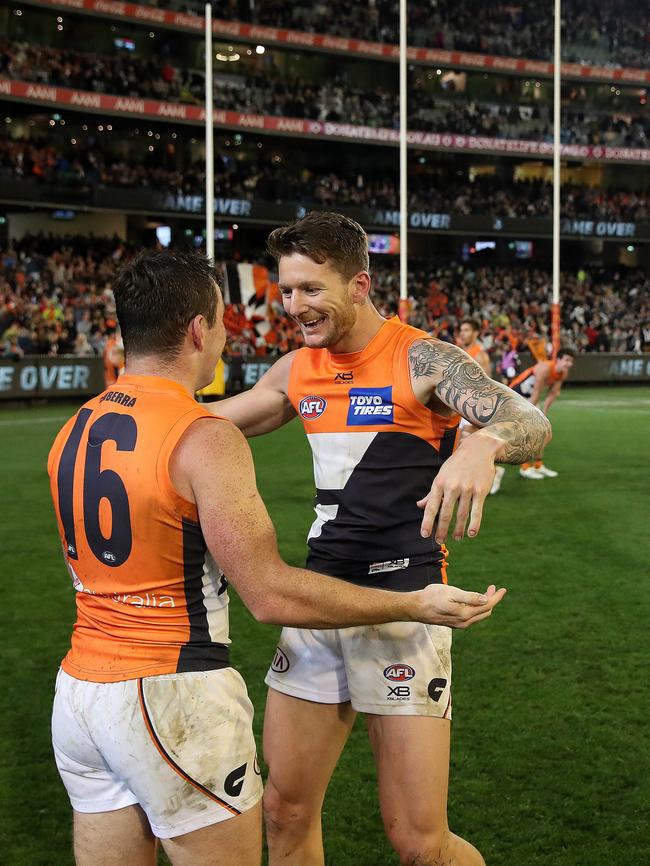 GWS Giants players Brent Daniels and Daniel Lloyd celebrate the defeat over Collingwood to get into the 2019 Grand Final. Picture: Phil Hillyard