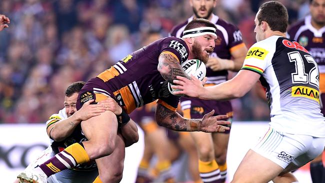 Josh McGuire on the charge for the Broncos against the Panthers at Suncorp Stadium.