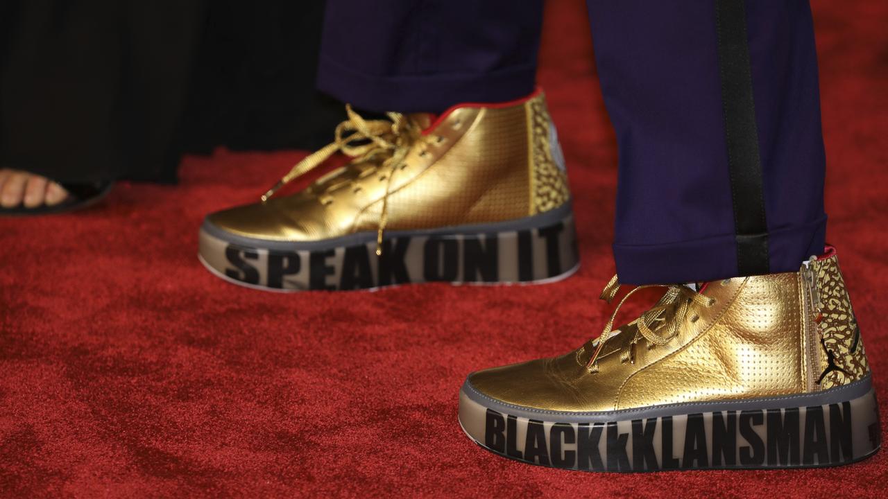 The custom-made gold shoes attracted plenty of attention. Picture: Vianney Le Caer/Invision/AP