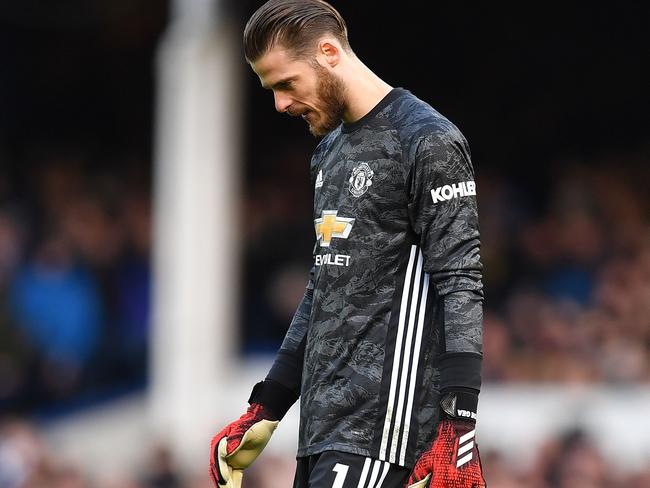 Manchester United's Spanish goalkeeper David de Gea reacts during the English Premier League football match between Everton and Manchester United at Goodison Park in Manchester United, north west England on March 1, 2020. (Photo by Paul ELLIS / AFP) / RESTRICTED TO EDITORIAL USE. No use with unauthorized audio, video, data, fixture lists, club/league logos or 'live' services. Online in-match use limited to 120 images. An additional 40 images may be used in extra time. No video emulation. Social media in-match use limited to 120 images. An additional 40 images may be used in extra time. No use in betting publications, games or single club/league/player publications. /