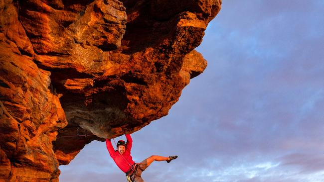 Tom Perkins tackles Feeling the Ceiling, a climb near the summit of Mount Arapiles. Picture: Jason Edwards