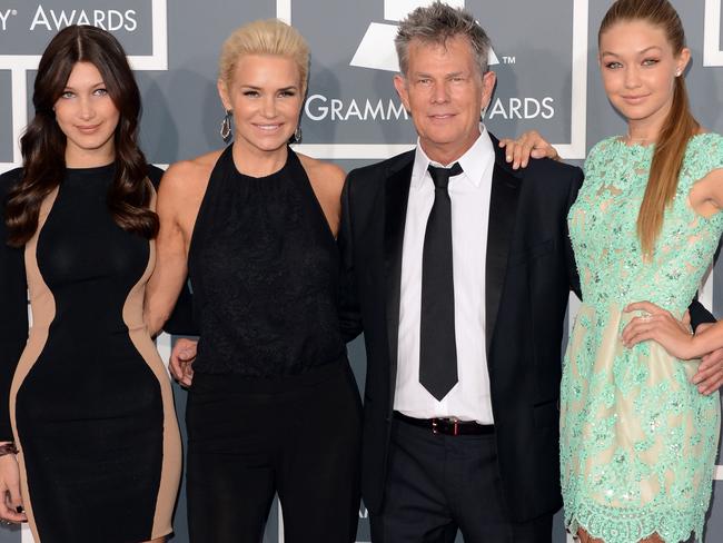 Producer David Foster (2nd from right) and Yolanda Foster (2nd from lef) with her daughters, Bella (left) and Gigi Hadid. Picture: Getty