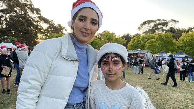 Templestowe's Shima and Janan Shahm enjoy Manningham's 2022 Carols.