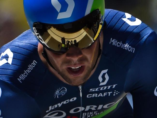 Australia's Michael Matthews crosses the finish line of the 37,5 km individual time-trial, the thirteenth stage of the 103rd edition of the Tour de France cycling race on July 15, 2016 between Bourg-Saint-Andeol and La Caverne du Pont-d'Arc. / AFP PHOTO / JEAN-PHILIPPE KSIAZEK