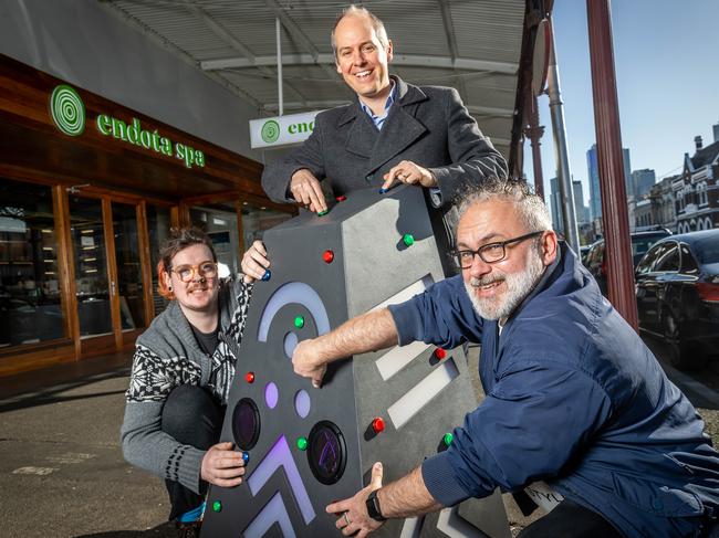 Marcus Pearl, centre, with game designer Eamonn Harte and RMIT’s Troy Innocent. Picture: Jake Nowakowski