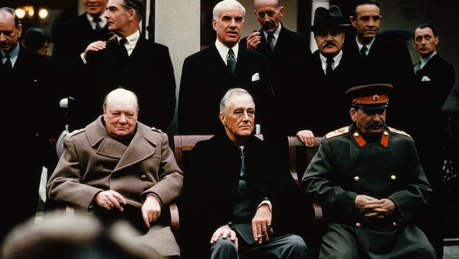 Soviet leader Stalin, American President Roosevelt and British Prime Minister Churchill seated together during the Yalta Conference, 1945.