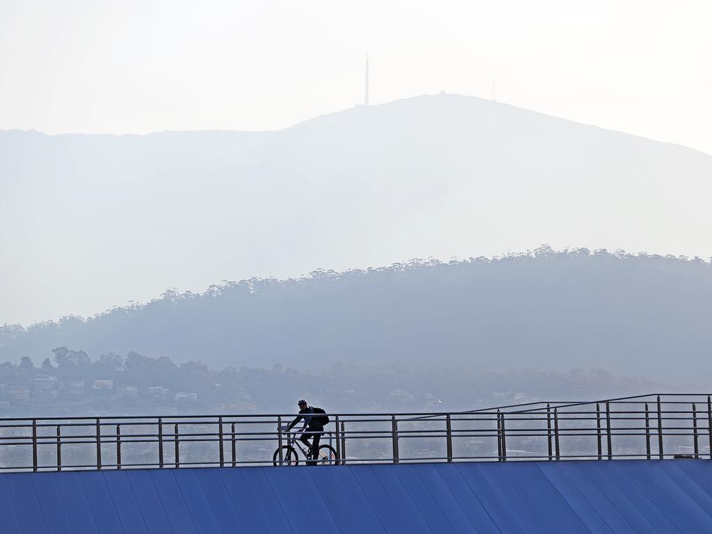 Smoke blocks out kunanyi/Mount Wellington, as seen from near the Brige of Remembrance. Picture: Zak Simmonds