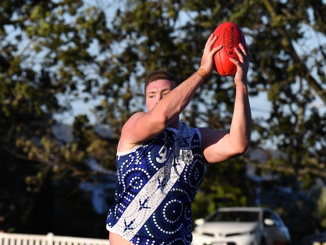 Mt Gravatt player Craig Malone QAFL Aussie rules match between Mt Gravatt and Surfers Paradise. Saturday July 17, 2021. Picture, John Gass