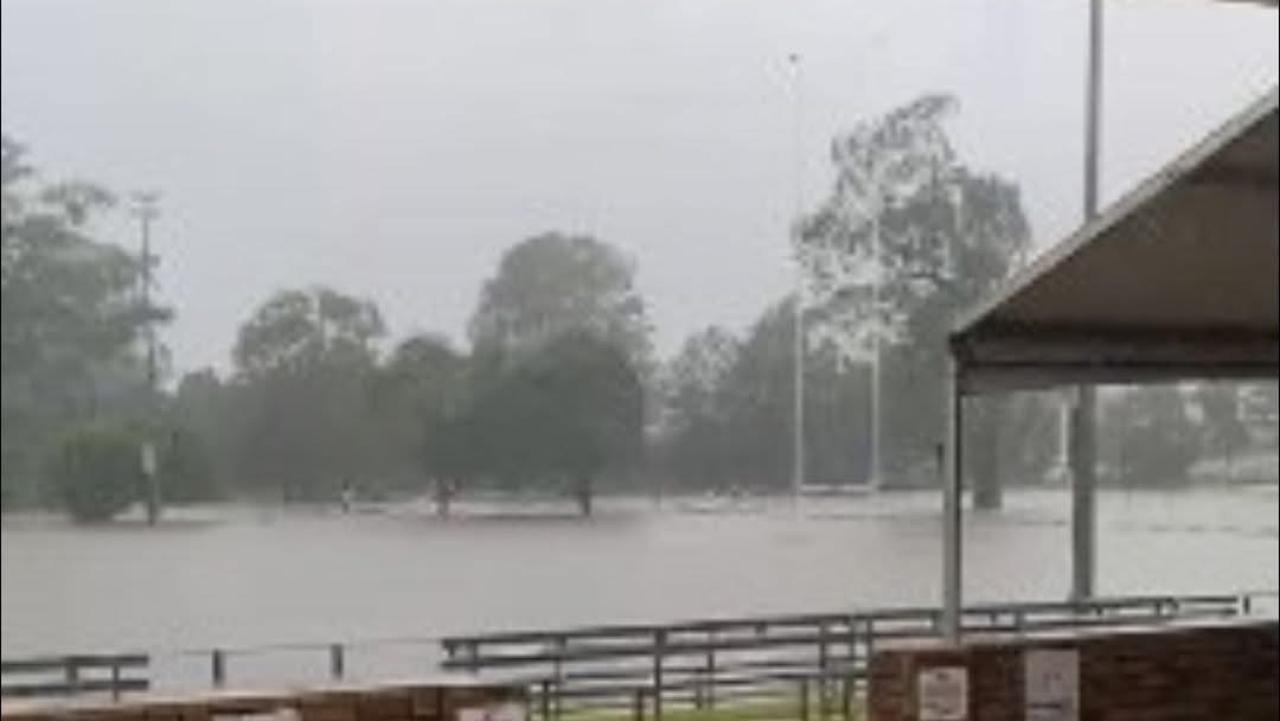 $50k time bomb: Rugby club face anxious wait as floodwater rises