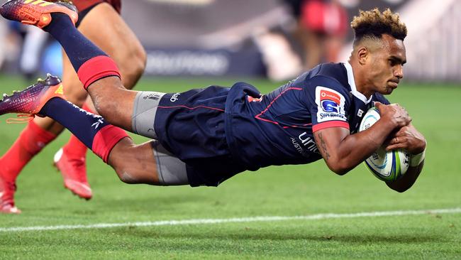 Will Genia dives over the line for a try. Picture: AFP Photo 