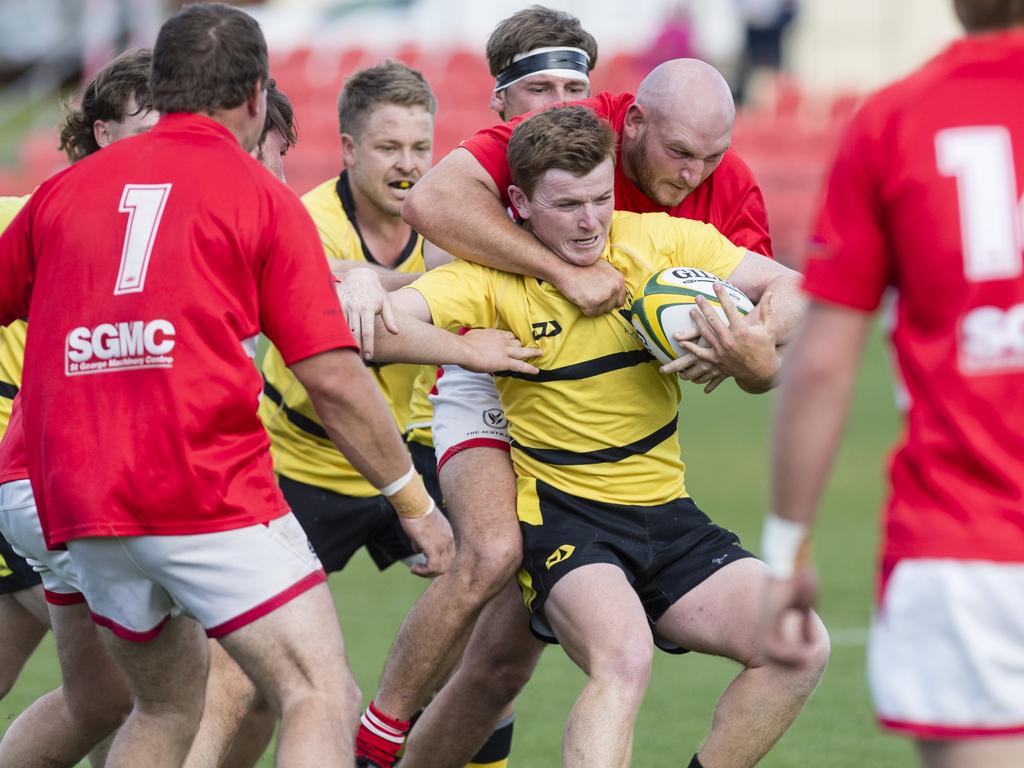 Lockie Smith of Goondiwindi Emus is tackled by Will Jones of St George Frillnecks. Picture: Kevin Farmer.