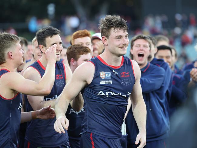 Harry Boyd from Norwood receives the player of the match medal after the SANFL Grand Final match between Norwood and North Adelaide at Adelaide Oval in 2022. Picture: SANFL Image/David Mariuz