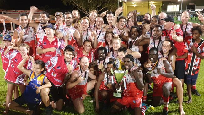 Winners are grinners: Katherine Souths players show off the BRFL premiership cup last night. Picture: Grey Morris