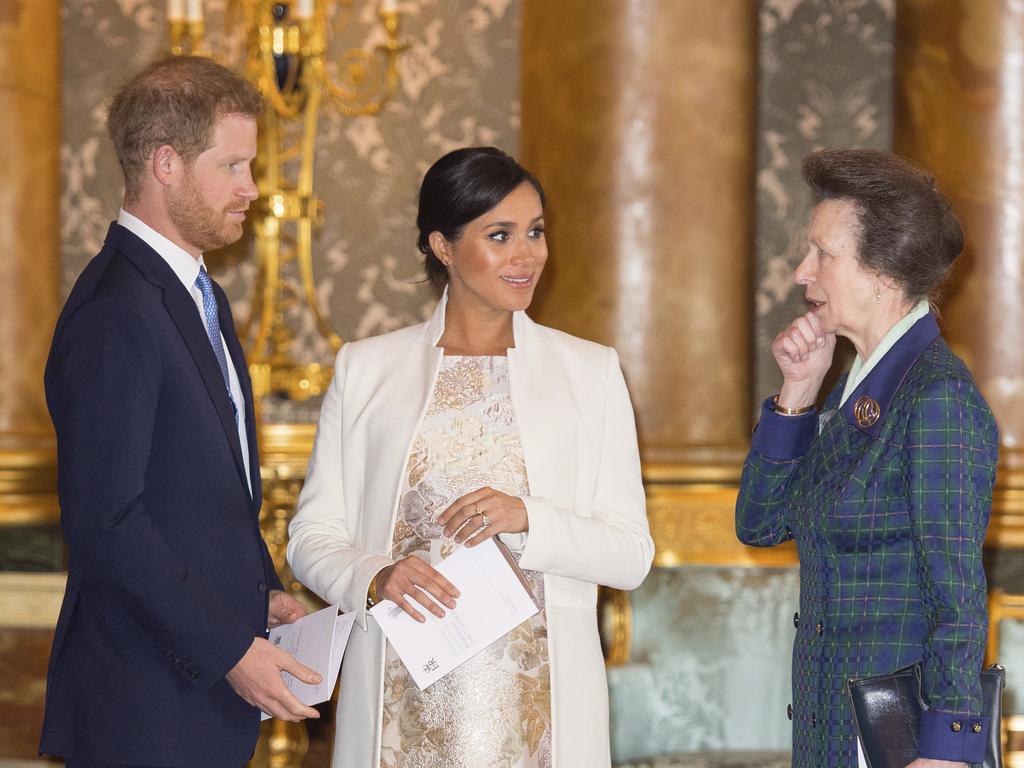 Princess Anne, seen here with Meghan and Harry, was almost knocked out by a crumbling piece of masonry. Picture: Dominic Lipinski/Pool via AP