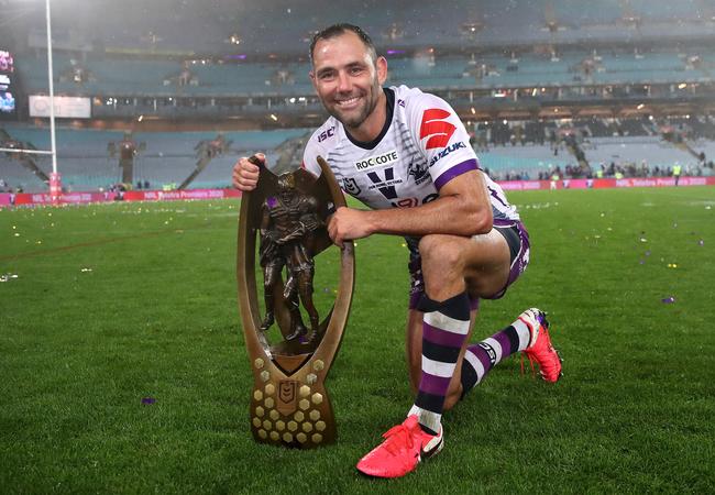 Cameron Smith of the Storm poses with the premiership trophy.