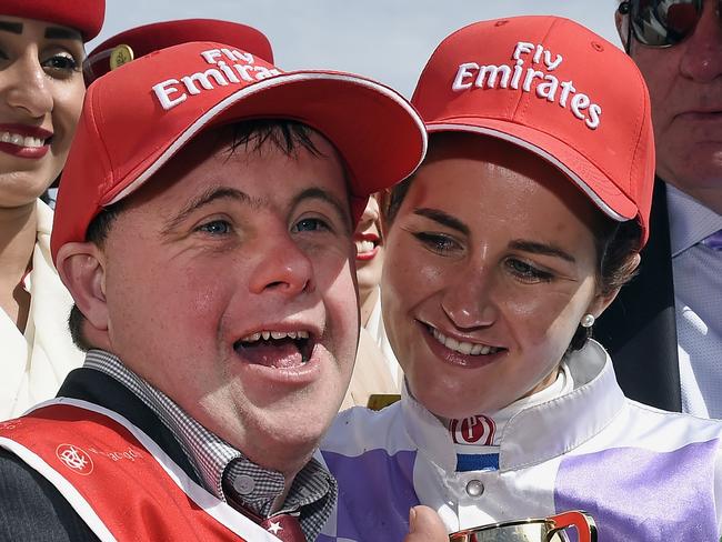 Strapper Stevie Payne celebrates with his sister. Picture: AP