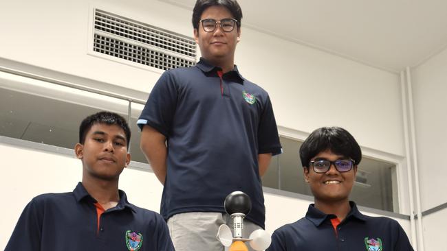 Darwin High School students Monishi Rangchak Tripura, Pothik Vincent Mondol, and Mohammad Niyaz Hasan have devised a strategy to cool rooms cheaply through apparent temperature optimisation. Picture: Sierra Haigh