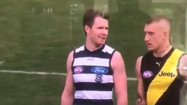 Patrick Dangerfield has a laugh with Dustin Martin.