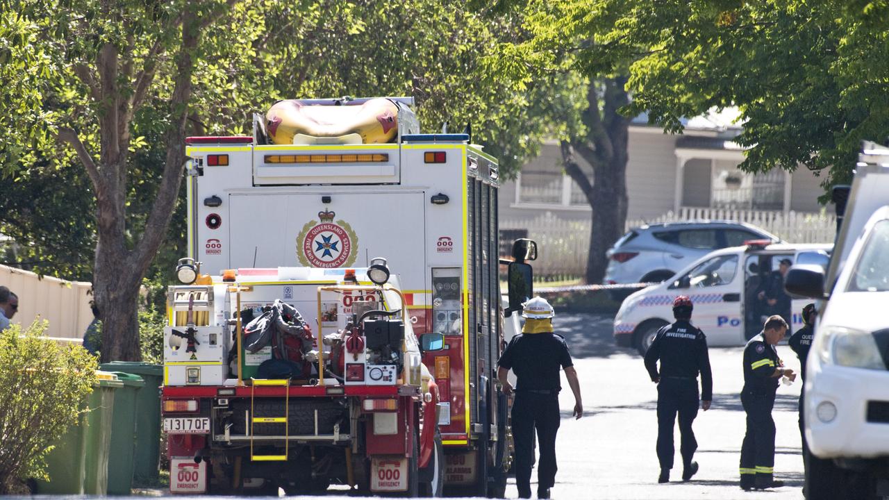 Police and fire investigators at the South Toowoomba crime scene. Picture: Kevin Farmer