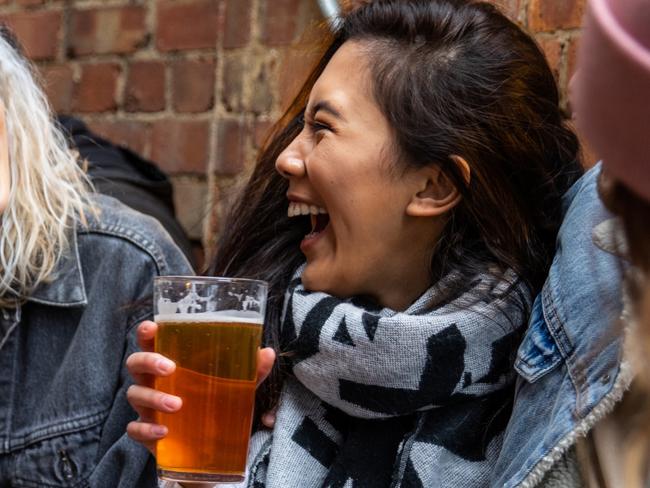 Londoners group of friends meet up in a pub. For: Friends. Credit: Istock