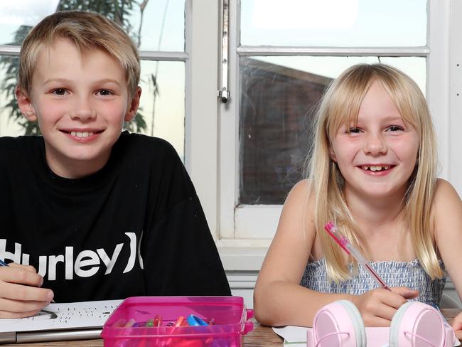 Gigi Molines, 7, with her brothers Axel, 4, and Oscar, 9, at home in Balgowlah. New guidelines say you should only spend 2.5 hours a week doing homeschooling. Picture: Jonathan Ng