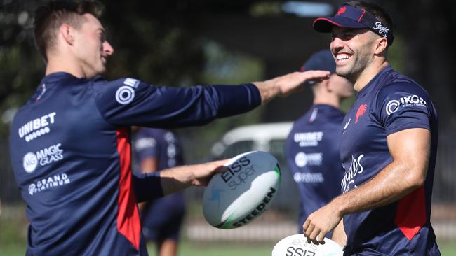 Sam Verrills and James Tedesco have a laugh at Roosters training. picture John Grainger