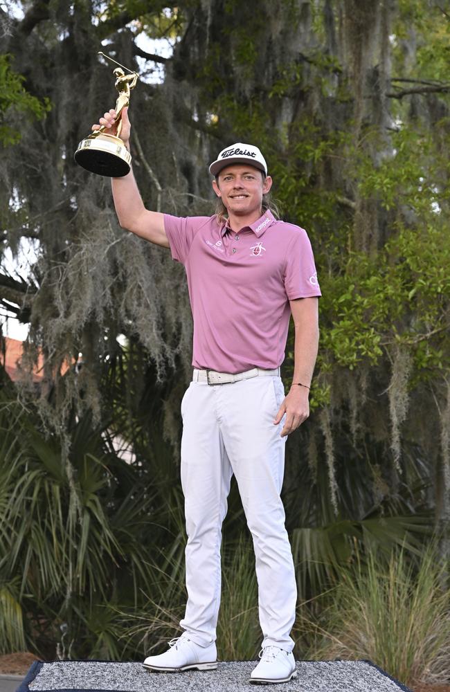 Just a bloke and his very special trophy. Picture: PGA Tour/Getty Images