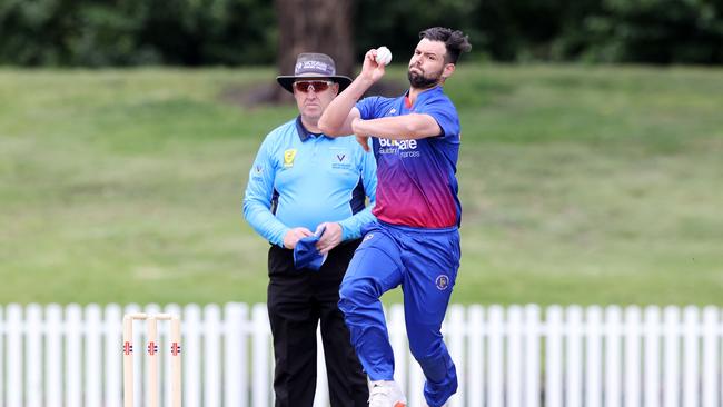 Premier Cricket: Northcote v Frankston Peninsula at Bill Lawry Oval. Northcote Melbourne, 21st November. James Nanopoulos of Frankston Peninsula bowling. Picture : George Sal